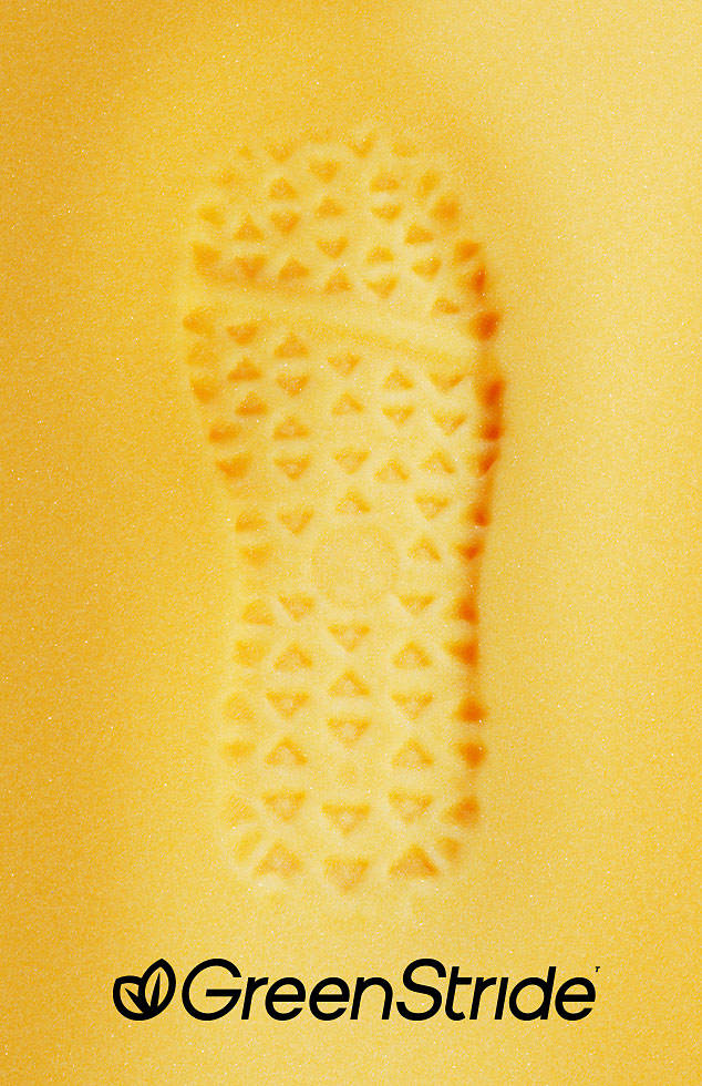 Image of a yellow foam sole on a yellow background with the words GreenStride.