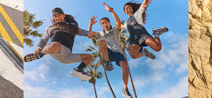 Timberland: 3 people jumping and wearing Timberland clothes and shoes