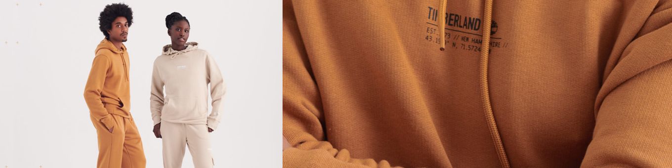 Large image of a brown hooded sweatshirt on a gray background, with white text which says 'Comfort From Nature' across it, and then 'the impossibly soft Luxe Comfort clothing collection'
