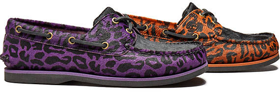 Image of two leopard print boat shoes in profile, one brown and one purple.