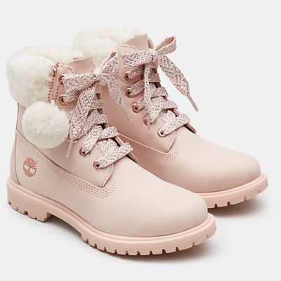 pink timberlands with bow