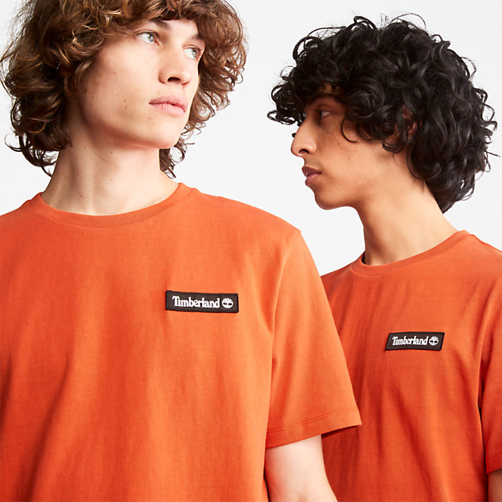 Camiseta Heavyweight Badge Unisex en naranja-