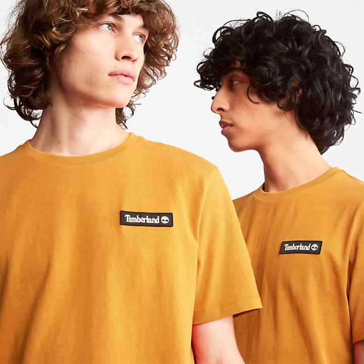Schweres All Gender Badge T-Shirt in Gelb-