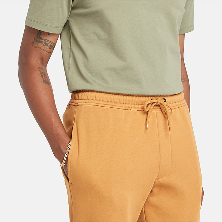 Pantalones de chándal con logotipo para hombre en amarillo oscuro
