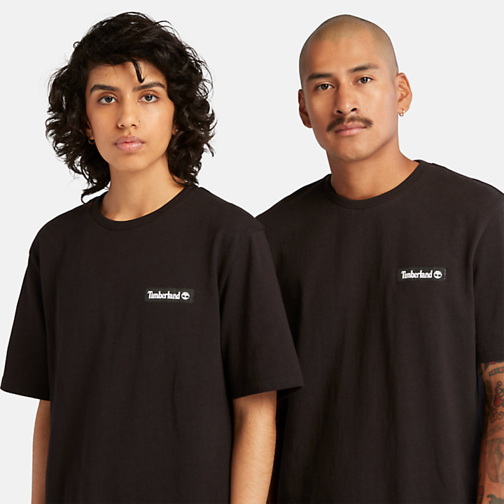 Camiseta unisex de alto gramaje con insignia tejida en negro-
