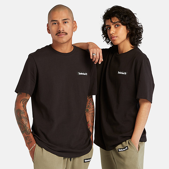 Schweres All Gender T-Shirt mit gewebtem Aufnäher in Schwarz
