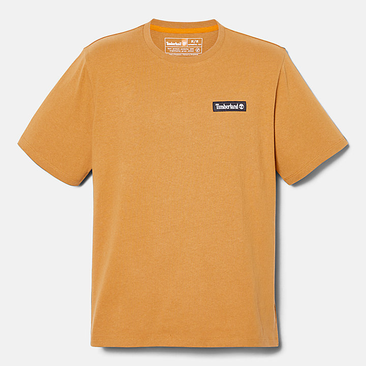 Camiseta unisex de alto gramaje con insignia tejida en amarillo