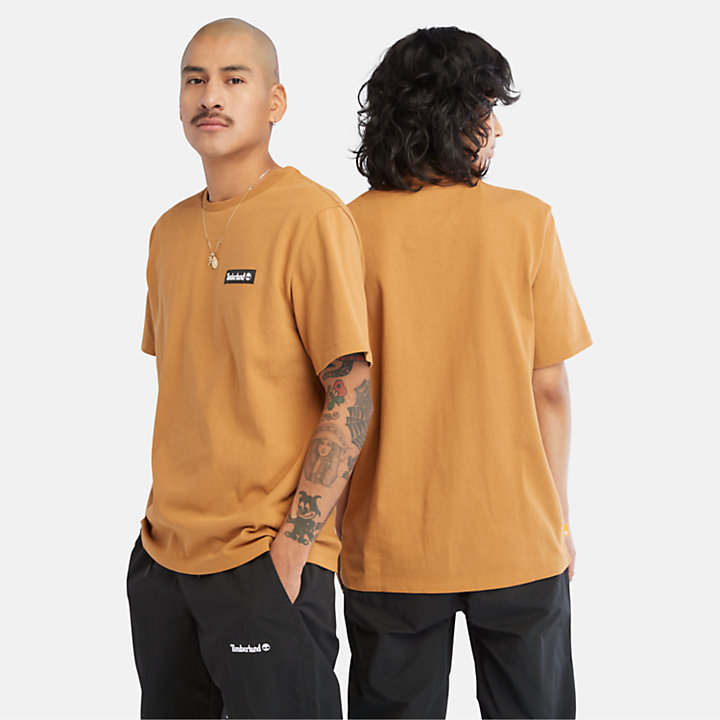 Camiseta unisex de alto gramaje con insignia tejida en amarillo-