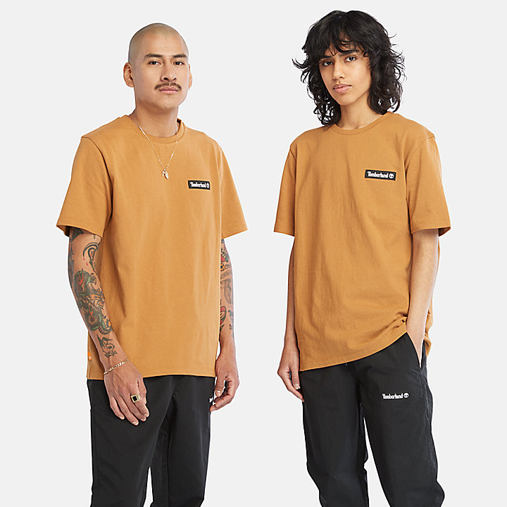 Schweres All Gender T-Shirt mit gewebtem Aufnäher in Gelb