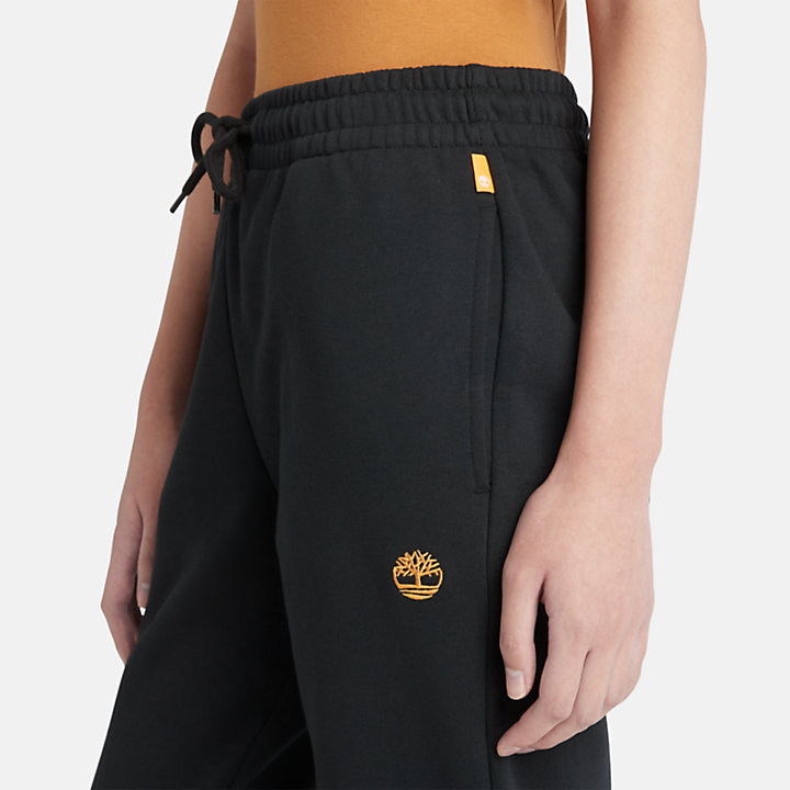 Pantalón de chándal con logotipo del árbol bordado para mujer en negro-