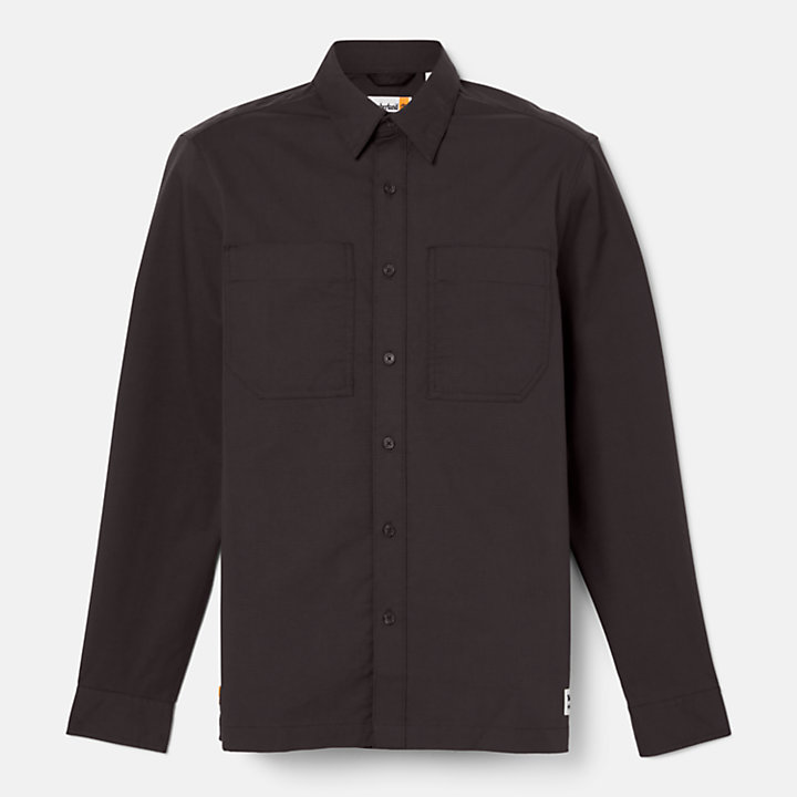 Camisa confeccionada con tecnología Outlast® para hombre en negro-