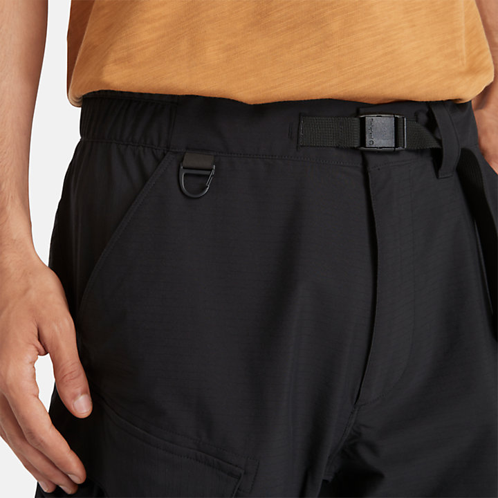 Pantalones cortos elásticos de secado rápido resistentes al viento para hombre en negro-