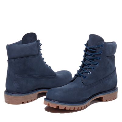 navy blue and gold timberlands