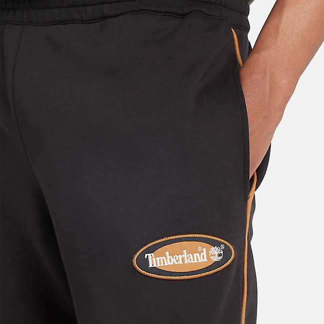 Pantalon molletonné avec écusson à logo ovale pour hommes